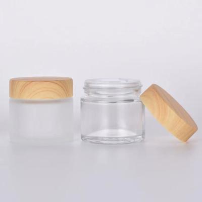 China Hot Sale Cosmetic Packaging Package Cream Glass Jar With Bamboo Lid for sale