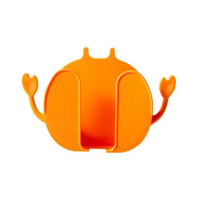 China Simple Creative Wall Mounted Mobile Phone Storage Bedside Crab Cartoon Aoniu Bracket Charging Stand for sale