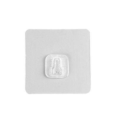 China Mother Wall Mounted Strong Traceless Button Without Patch Wall Mounted Household Punch Essential Shelving Accessories for sale