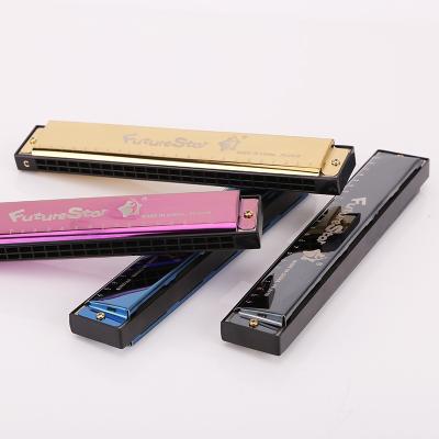 China Futurestar Plastic Tremolo Harmonica C 24 Key Holes Harmonica With Black Box For Students for sale