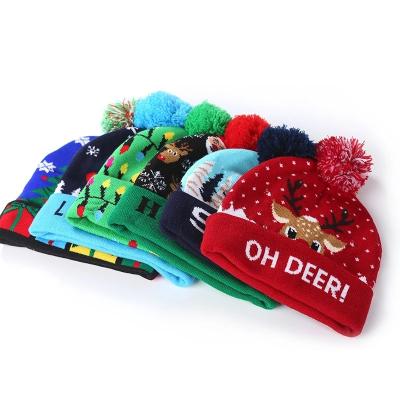 China COMMON Christmas Hats Sweater Santa Knitted Beanie Hat With LED Light Up Cartoon Pattern Christmas Gift For Kids New Year Supplies for sale