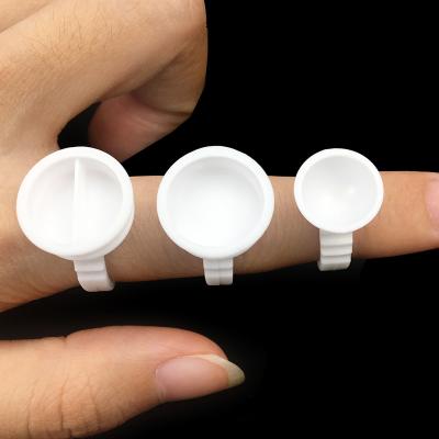 China Convenient Plastic Lash Extension Glue Ring 100pcs/bag Eyelashes Glue Holder Ring for sale