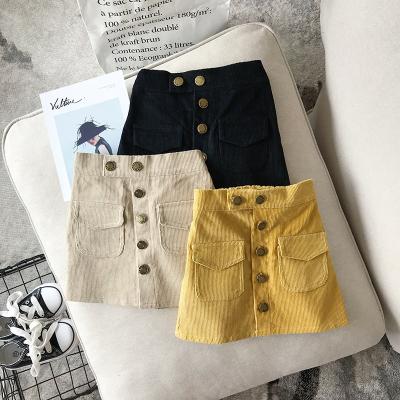 China 2021 new arrival breathable corduroy skirts girls a line button pocket skirt kids clothing wholesale children clothing for sale