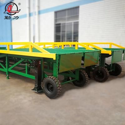 China Easy Operation Mobile Hydraulic Mobile Dock Leveler Yard Forklifts Container Loading Ramps for sale