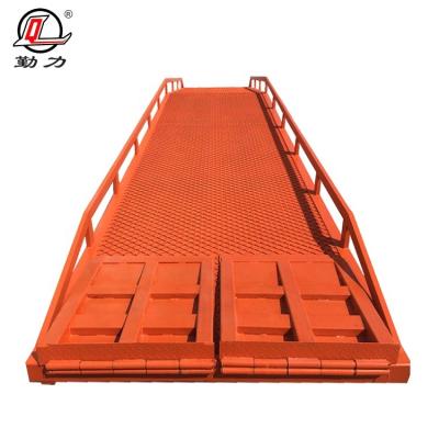 China Cheap Price Easy Operation 12000kg Electric Hydraulic Car Ramp Portable Dock Lift Platform For Sale for sale