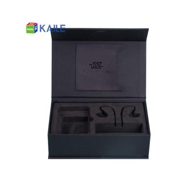 China Recycled Materials Black Cardboard Packaging Box Cell Phone Magnetic Paper Box With Foam Insert for sale