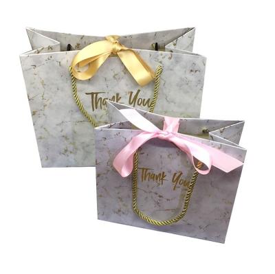 China Recyclable Custom Elegant Marble Luxury Paper Bag Wedding Party Boutique Gift Paper Bag With Different Types Of Handle for sale