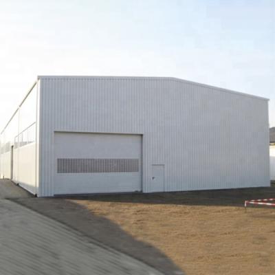 Китай Modern prefab heavy steel hangar/factory workshop steel structure building with high quality продается