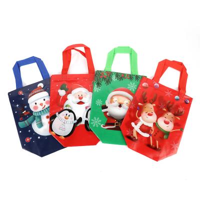 China 2021 Recyclable Amazon Christmas Handbag Foreign Trade Consumables Nonwoven Color Print Coated Candy Bag for sale