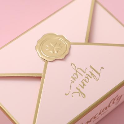 China New Simple Custom Creative Biodegradable Gift Box Packaging Envelope Shape Wedding Bronzing Candy Bags Birthday Party Cosmetic Packaging Box for sale