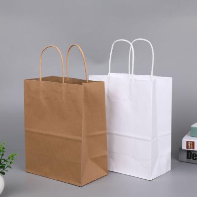 China Recycled Materials Custom Twisted Handle Paper Bags Gift Bags Bulk Shopping Kraft Retail Party Bags for sale