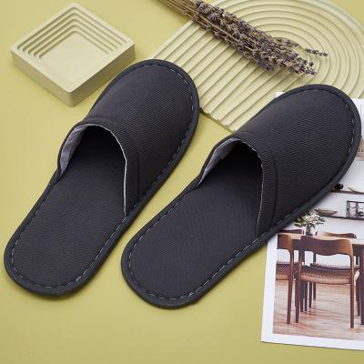 China Exquisite Disposable Hotel Amenities Factory direct sale modern design customized logo luxury dark grey disposable hotel slippers for sale