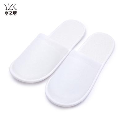 China Exquisite Disposable Hotel Amenities Disposable customized fabric white hotel slippers Nap cloth indoor slipper for hotel home guest for sale