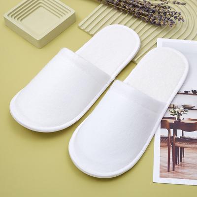 China Exquisite Disposable Hotel Amenities Nap Cloth Slippers Custom Disposable White Hotel Slippers With Logo for sale