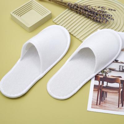 China Exquisite Disposable Hotel Amenities Supplier price custom hotel amenities napped fabric white disposable slipper for wedding hotels bathroom spa for sale