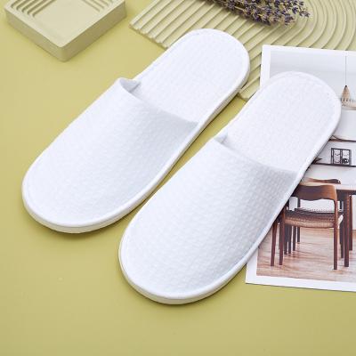 China Exquisite Disposable Hotel Amenities blank sublimation disposable eco friendly waffle hotel slippers for homestay hotels for sale