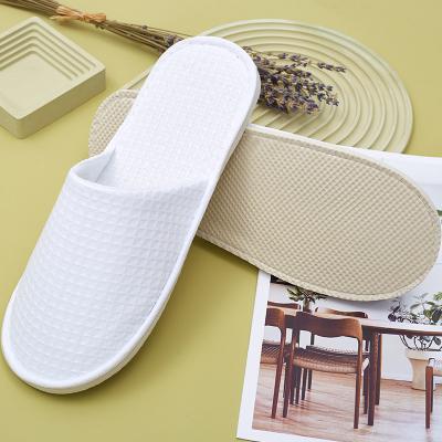 China Exquisite Disposable Hotel Amenities High Quality Good Health eco bathroom supplies Custom Logo Waffle Slipper Luxury Hotel Disposable Slippers for sale