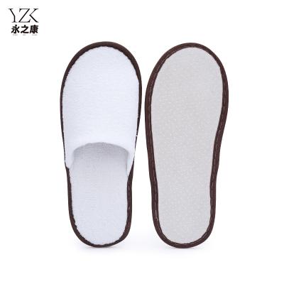 China Exquisite Disposable Hotel Amenities Custom anti slip Soft Closed Toe Washable White Coral Fleece Guests Room Disposable Hotel Slippers for sale