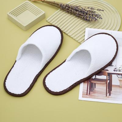 China Exquisite Disposable Hotel Amenities Hotel amenities OEM Custom Logo Luxury White Hotel Room Spa Guest Disposable Coral velvet slippers for sale