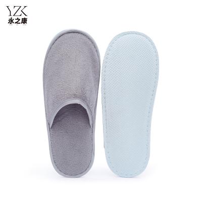 China Exquisite Disposable Hotel Amenities Wholesale Grey Washable Hotel Slippers Room Spa Guest Disposable Fluffy Coral Fleece Slippers for sale