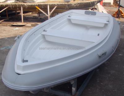 China Small Fiberglass Dinghy Fiberglass Fishing Boat Rowing Paddle Boat3.3m With High Pressure Air Pipe for sale