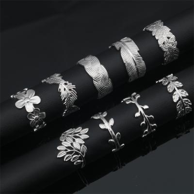 China Vintage Stainless Steel Ring Flower Leaf Maple Leaf Opening Adjustable Titanium Steel Index Finger Ring for sale