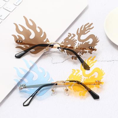 China Unique Fashion Personalized Fancy Party Decorative Glasses Fashion Sunglasses Metal Cool Rimless PC Glass for sale