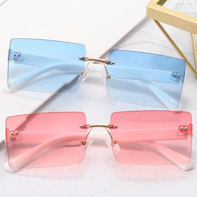 China Rimless Rimless Rectangle Studded Sunglasses Lens Rivet Fashion Metal Frame Eyewear For Women Men for sale