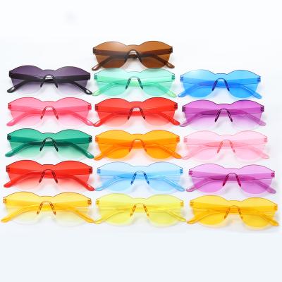 China Cheap Rimless Sunglasses Fashion One Piece Candy Color Shades Rimless Sunglasses for sale