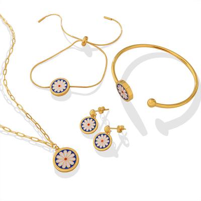 China Hiphop INS Hot Selling Jewelry Set Oil Tidal Daisy Necklace Bracelet Bangle Earrings Titanium Steel Gold Plated Jewelry Set for sale