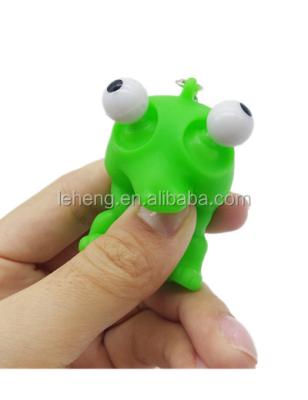 China Promotional Dinosaur PVC Squeeze Key Chain Toy With Pop Eye Green Dinosaur Key Chain for sale