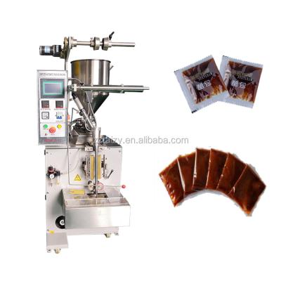 China Easy Operation Automatic Vertical Paste Packing Machine With Printer for sale