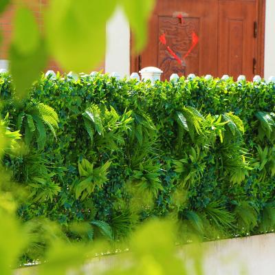 China Plant Sale 100x100cm UV Waterproof Vertical Garden Green Foliage Plants Wall Covering For Balcony for sale