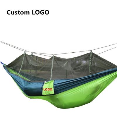 China Sale 260*140cm durable comfortable easy hanging colorful outdoor camping nylon foldable parachute hammock with mosquito net for sale