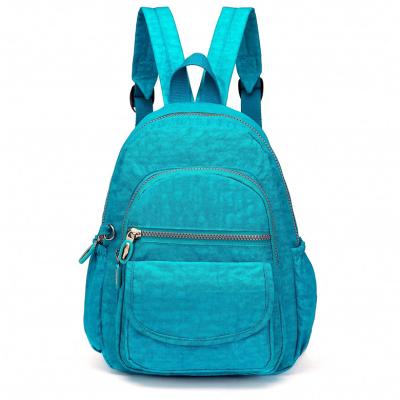 China Customized Lightweight Blue Mini Size School Bag Waterproof Backpack For Girls for sale