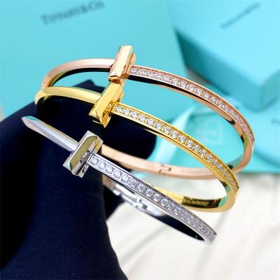 China Tiffan CLASSIC Famous Luxury Designer and Co. Brand Titanium Stainless Steel ZIRCON Stones Jewelry Inlaid Women Bracelet Bangle. for sale