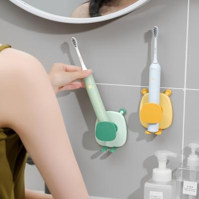 China Wholesale Viable Bathroom Wall Hanging Cartoon Electric Toothbrush Storage Rack Toothbrush Holder for sale