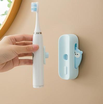 China Viable Bathroom Wall Paste Cartoon Wall Receive Electric Toothbrush To Stretch Bathroom Hanging Bar for sale