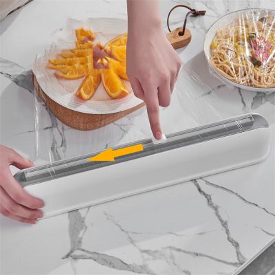 China Type stone type tool office cutting knife hanging viable aspiration refrigerator suction cup of plastic wrap plastic wrap cutter for sale