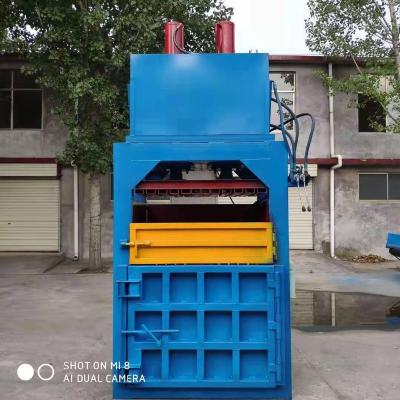 China Hydraulic products vertical type wrapping machine/press for pet bottles/pp pe film/paper/carton box for sale