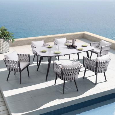 China Mugao Patio Furniture Eco - Friendly Garden 7 Piece Outdoor Dining Patio Set Set Modern Outdoor Dining Set for sale