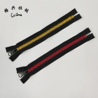 China Fashionable Wholesale Custom No. 5 Letter Resin Zipper Design Fashionable Style Plastic Zipper for sale