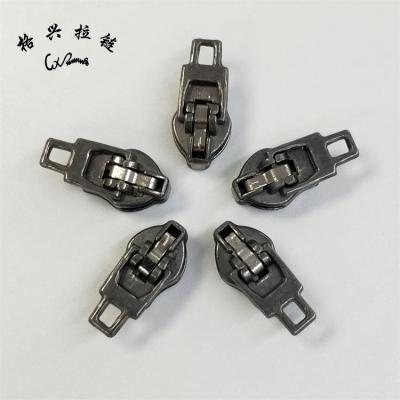 China 3# 5# YG Non Magnetic Wholesale Custom Spring Lock Slider Without Zipper Rubber Head for sale