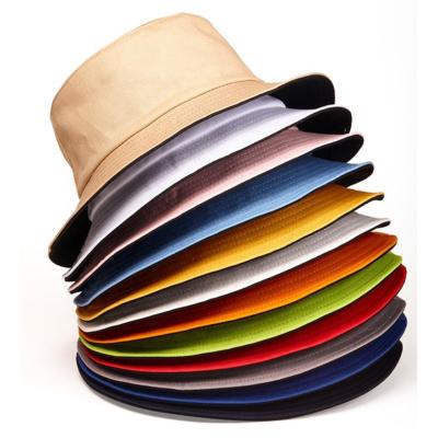 China Summer Wholesale High Quality Adult Outdoor Beach Wide Brim Character Cotton Bucket Loose Reversible Hat for sale