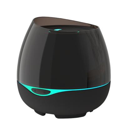 China Color Changing Small Circle 300ml LED Light Aromatherapy Air Purifier Wireless Connection Humidifier High Quality Colorful Lighting Humidifier for sale