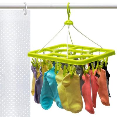 China Adjustable Clip And Drip Clothes Drying Hanger for sale