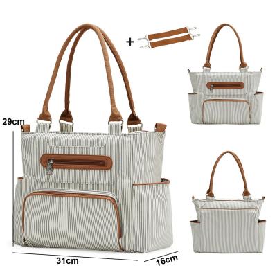 China Water Resistant 3 in 1 Solid Luxury Leather Baby Nappy Bag Tote Bag Baby Nappy Diaper Changing Tote Bag for sale