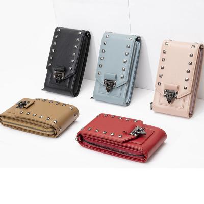 China Small waterproof cross - body phone wallet purse with cross strap rivet cross - body shoulder bag for sale