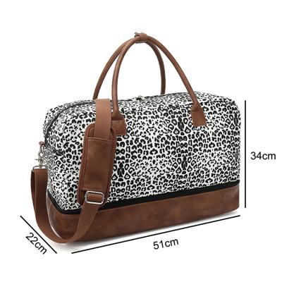 China Women Canvas Travel Weekender Leopard Waterproof Handbag Overnight Duffel Bag for sale