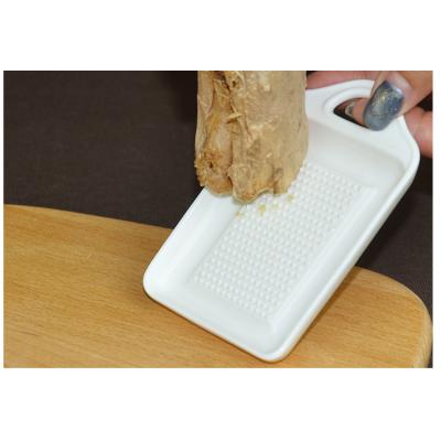 China Viable Ceramic Manual Garlic Ginger Puree Radish Grinder Tool for sale